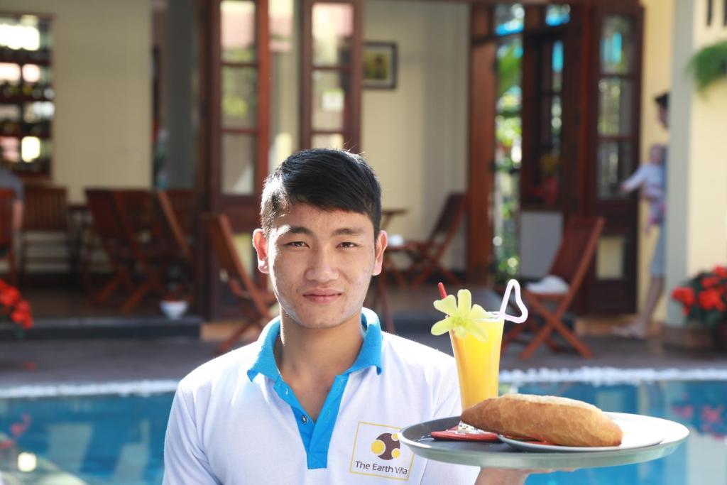 The Earth Villa Hoi An Bagian luar foto